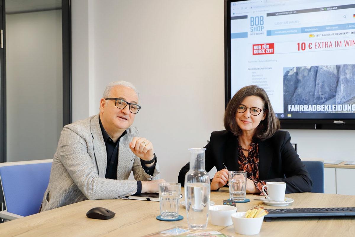 Angelo Nanni and a colleague at the Bobshop office